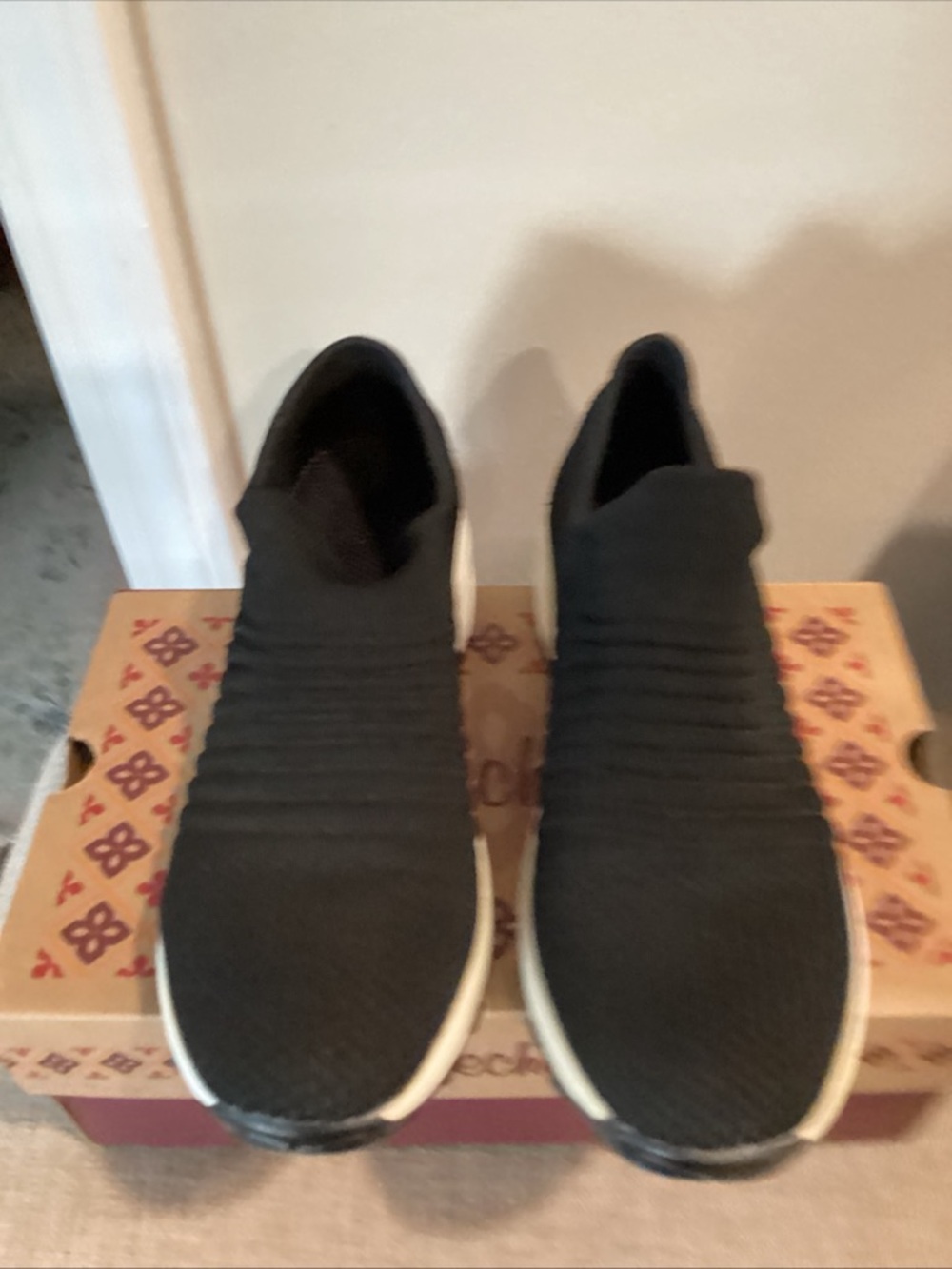 Slip-On Knit Sneakers in black and white